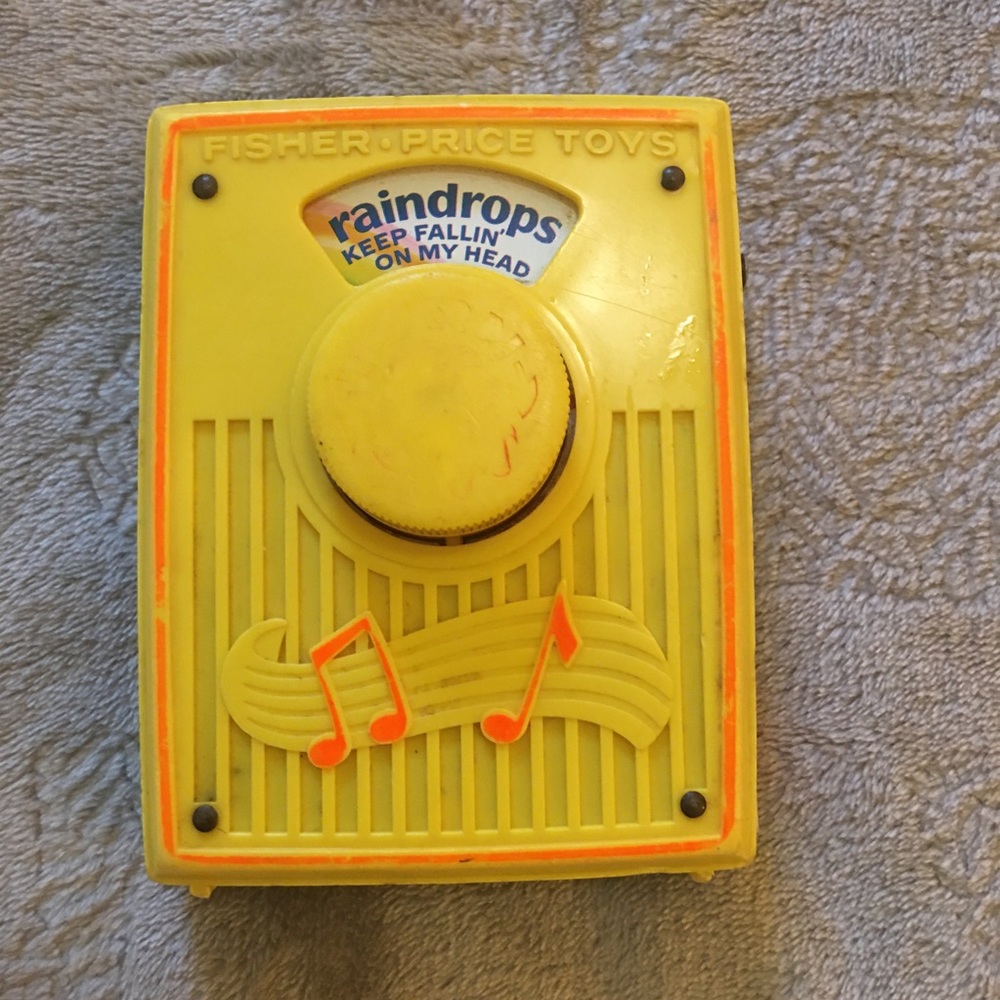 Fisher-Price “Raindrops” Pocket Radio #762 1972 no strap, winding and music work
